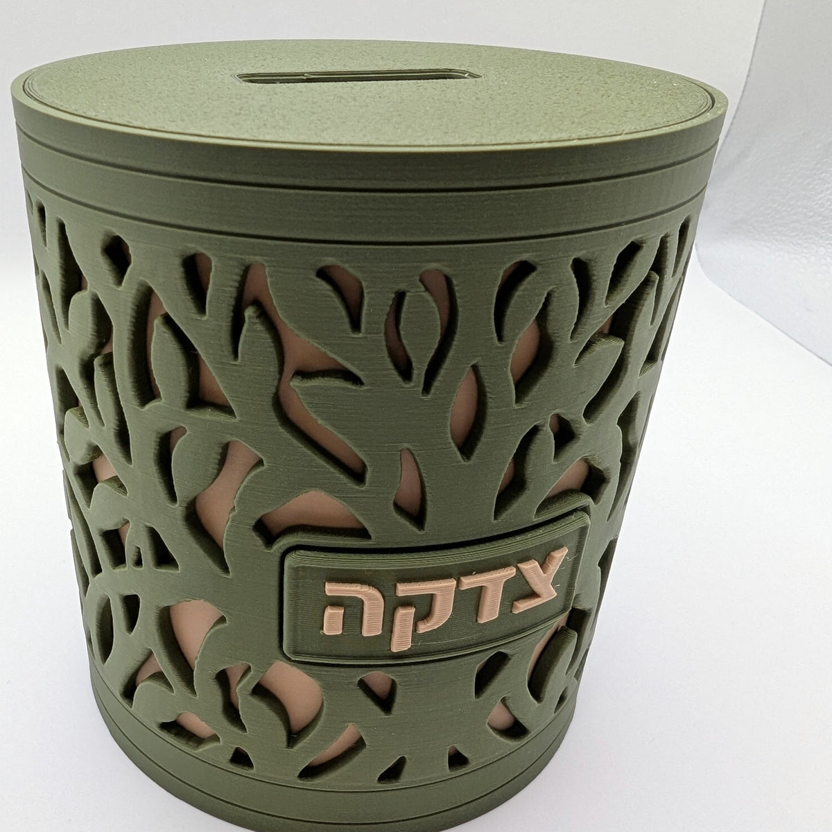 Tree of Life tzedakah box seen from below the rim
